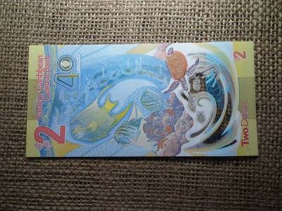 Karibi államok 2 dollár 2023 , A Kelet-karibi Központi Bank 40 éve , UNC  Karibi államok 2 dollár 2023 , A Kelet-karibi Központi Bank 40 éve , UNC
