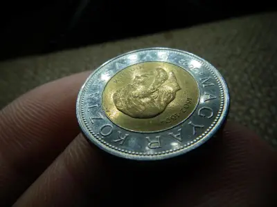 Kossuth 100 forint, 2002, verőtőcsorbulás, anyagtöbblet