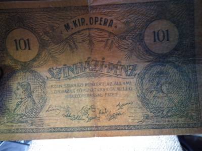 Magyar Királyi Opera Szinházi Pénz , ezen szinházi pénzért az állami szinházak főpénztára egy meleg kézfogással fizet 101 Magyar Királyi Opera Szinházi Pénz , ezen szinházi pénzért az állami szinházak főpénztára egy meleg kézfogással fizet 101